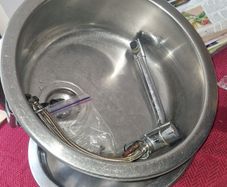 Round sink and tap