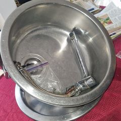 Round sink and tap