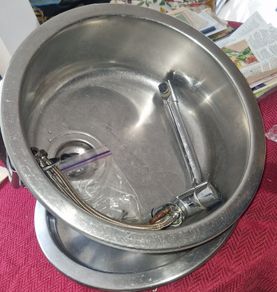 Round sink and tap