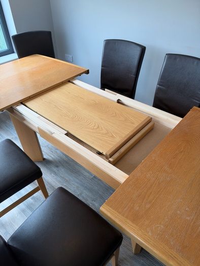 Oak extendable dining table + chairs