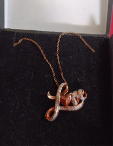 Sterling silver,gold plated with diamonds,pendant