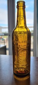 Coughlan Macroom amber pictorial bottle