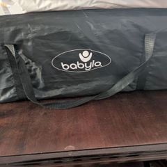 Travel cot and changing mat