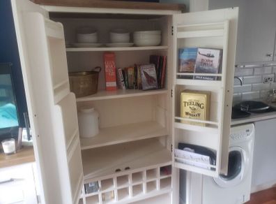 Kitchen cabinet, press