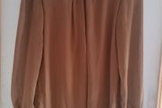 Brand New. Chiffon top with sequined shoulders