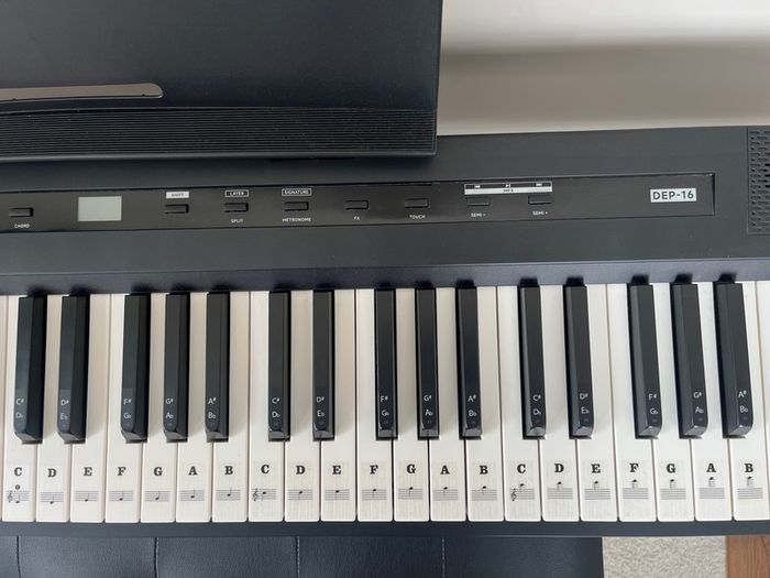 piano, bench and audio transmitter