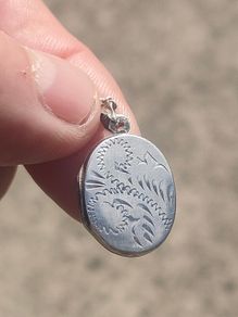 Early 20th century Sterling Silver locket pendant set