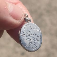 Early 20th century Sterling Silver locket pendant set