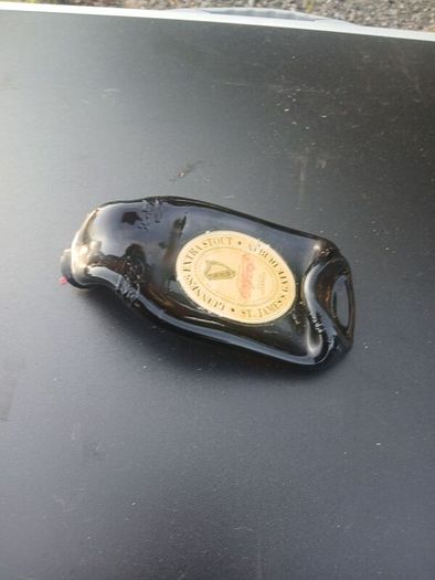 melted guiness bottles