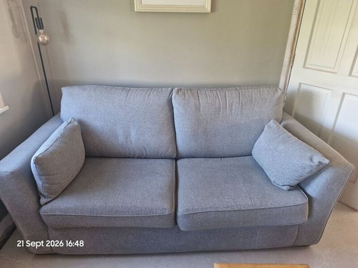 Two Light Grey  3  Seater Sofas + 2 Footstools