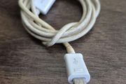 USB-A to Micro-USB charging cable.