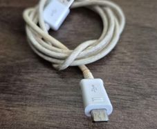 USB-A to Micro-USB charging cable.