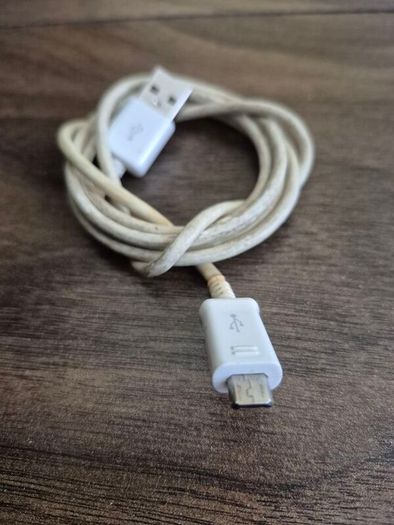 USB-A to Micro-USB charging cable.