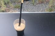guiness can pouring illusion