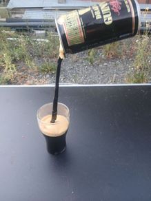 guiness can pouring illusion