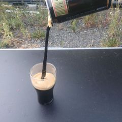 guiness can pouring illusion