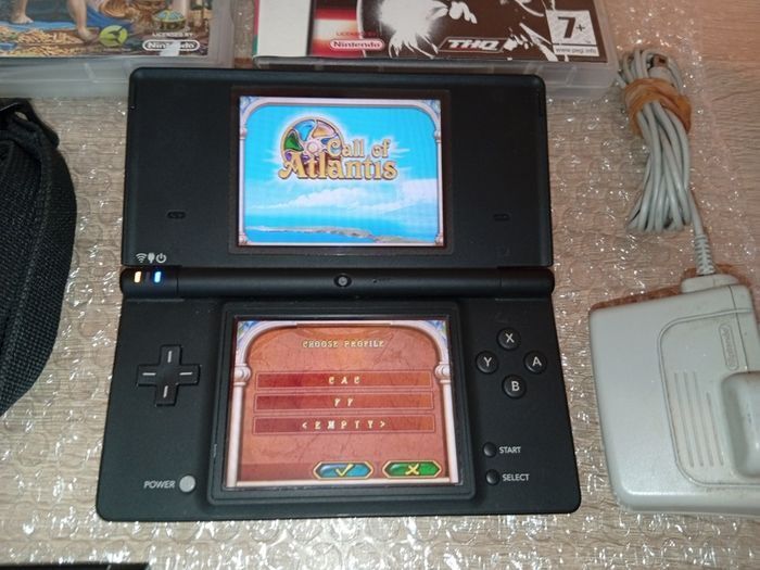 Nintendo Dsi In Black With Games And Official Carry Case