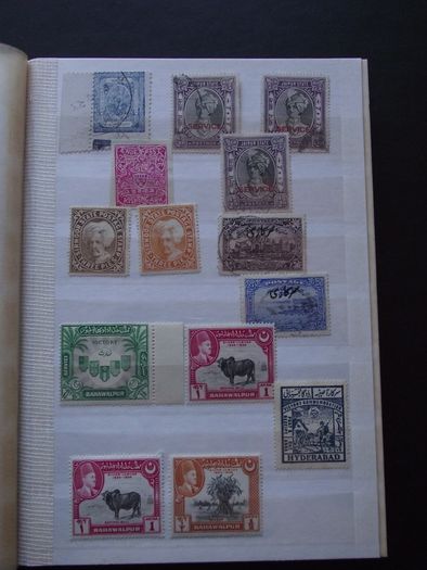 A extensive collection of Stamps from Indian States, presented in the album