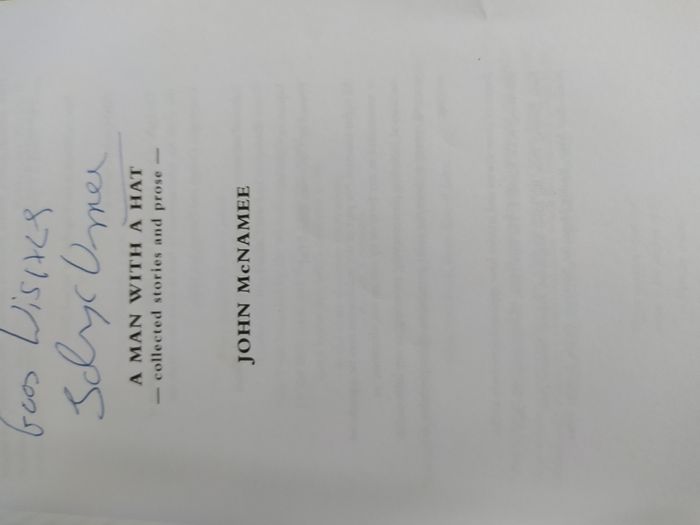 A Man With A Hat / John McNamee
