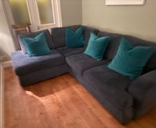 DFS Navy Corner Sofa with Storage Footstool.  Excellent Condition