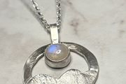 Handmade sterling silver pendant with a moonstone and an 18 inch necklace
