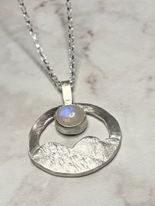 Handmade sterling silver pendant with a moonstone and an 18 inch necklace