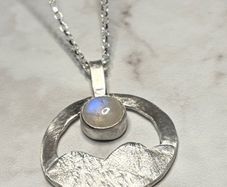 Handmade sterling silver pendant with a moonstone and an 18 inch necklace