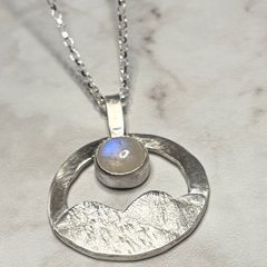 Handmade sterling silver pendant with a moonstone and an 18 inch necklace
