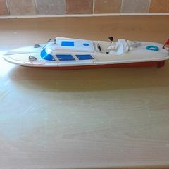 vintage 1970s wind up speed boat made in west Germany.