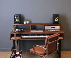 Studio desk with adjustable legs