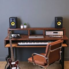 Studio desk with adjustable legs