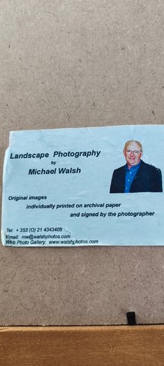 Framed Photograph art print depicting a rushing stream or waterfall, labeled -Glendalough - Co Wicklow- and hand-signed by the artist by Michael Walsh.
