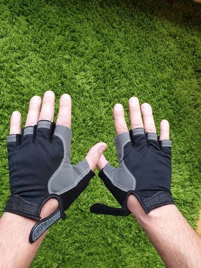 Gym gloves. Fingerless gloves. Cycling gloves. Work gloves. Carpenter gloves. Weightlifting. Workout.  Fitness.  Bodybuilding
