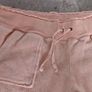 orange tracksuit bottom fits size sm worn Image 2