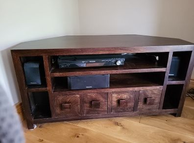TV corner unit (walnut) with storage.