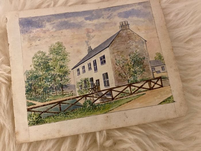 Early century water colour of a country house
