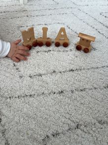Letters, toys. Name Mia