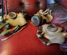 Three gas masks.