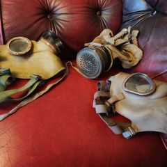 Three gas masks.