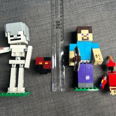 lego 21150 Minecraft Skeleton BigFig and 21148 Steve BigFig with parrot