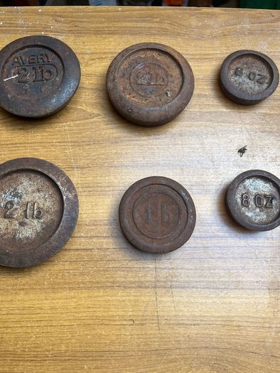 8 old scales weighs