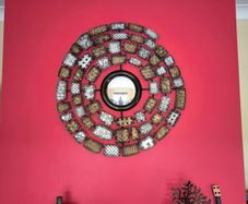 Metal wall art with mirror