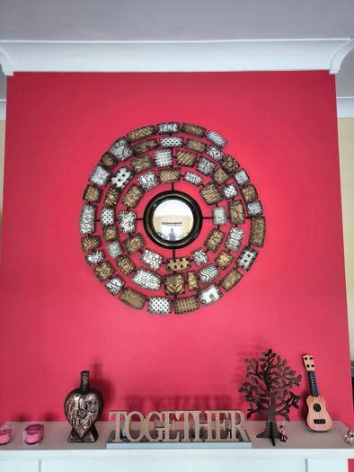 Metal wall art with mirror