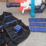 Nerf Gun extra large with bullets and gun vest to hold bullets. Image 3
