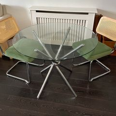 Glass table with two chairs
