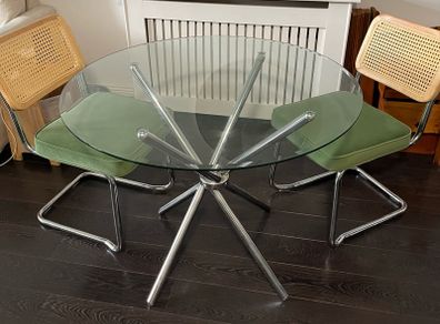 Glass table with two chairs