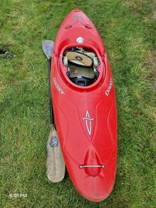 Dagger kayak + paddle + dry bottoms and spray deck.