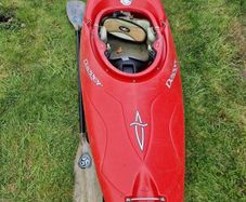 Dagger kayak + paddle + dry bottoms and spray deck.