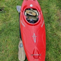 Dagger kayak + paddle + dry bottoms and spray deck.