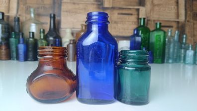 462 - Set of Three Beautiful Vintage Glass Decorative Collectible Bottles - Amber Eire Bovril, Cobalt Blue Magnesia and Turquoise Science Cream